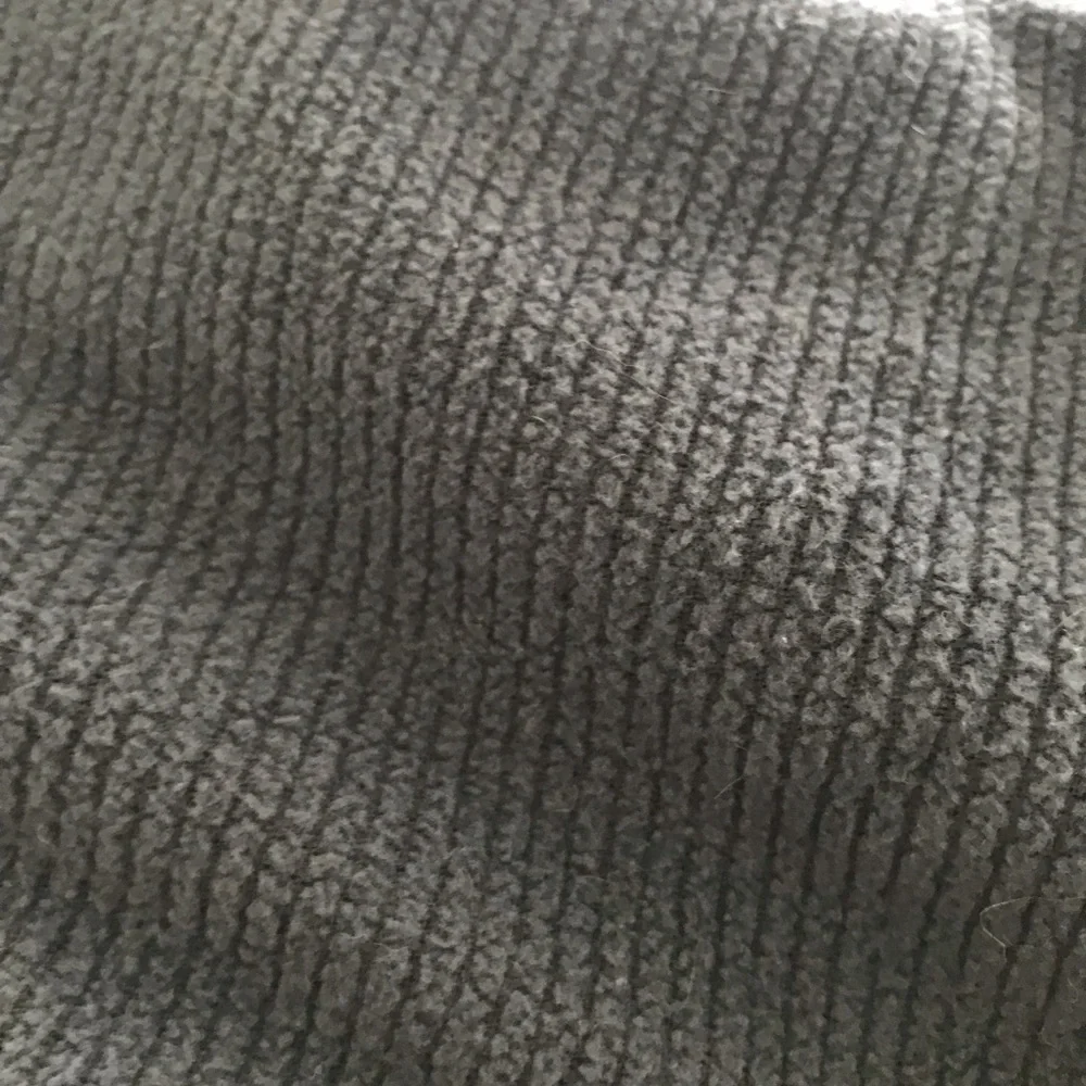Navy one piece stretch loveseat slipcover. In good used condition.